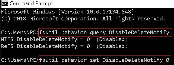 Janela do Prompt de Comando mostrando a saída de fsutil behavior query DisableDeleteNotify, com resultado 0 indicando que o TRIM está ativado.
